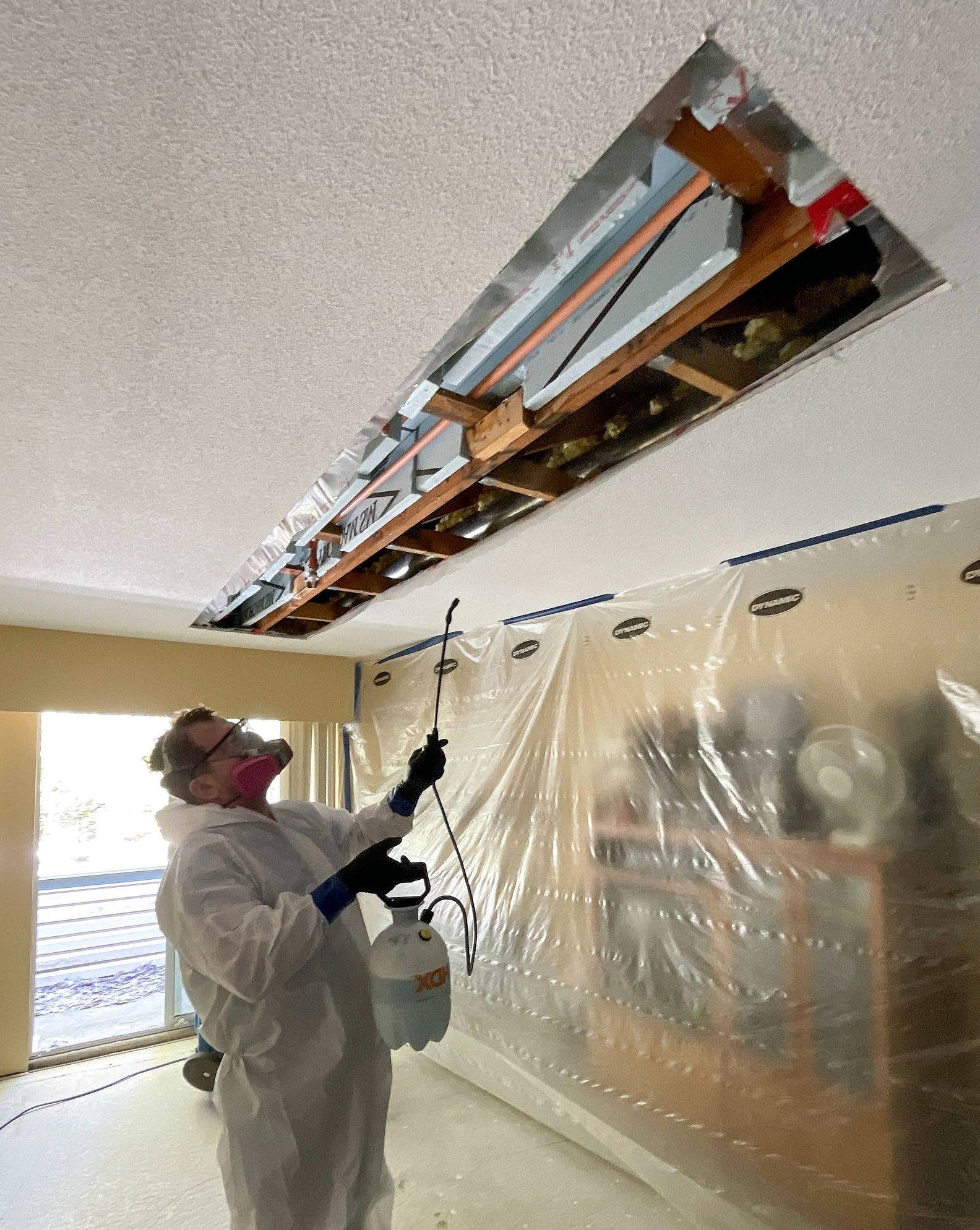 Technician in protective gear during a containment job